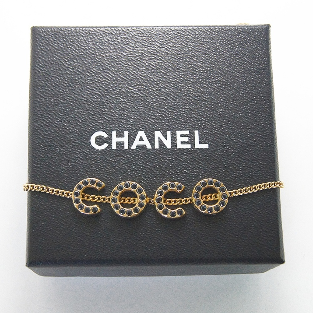 Chanel coco logo gold necklace with black crystals